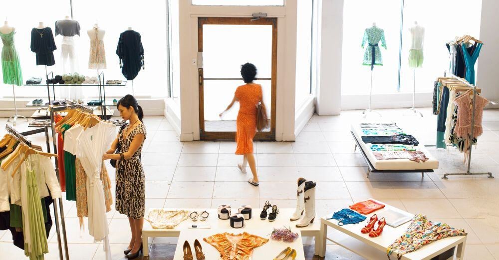 Woman walking out of a store without buying—retail abandonment and lost sales concept